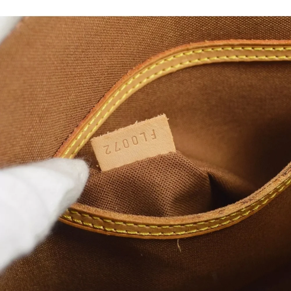 LOUIS VUITTON Alma Monogram Handbag - Picture 9 of 9